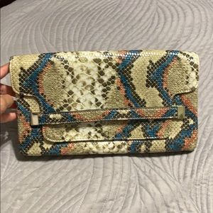 Faux snake skin clutch